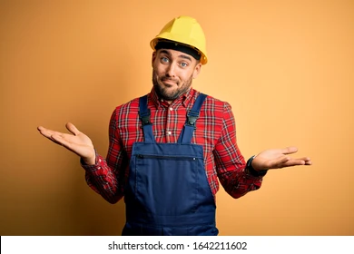 young-builder-man-wearing-construction-260nw-1642211602